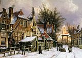 A Townview with Figures on a Snow Covered Street by Willem Koekkoek